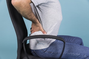 Що може бути причиною болю в спині?